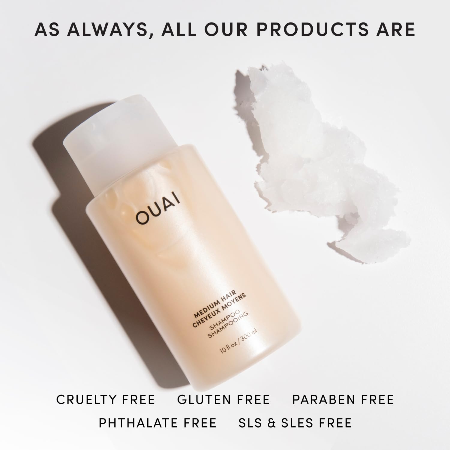 OUAI bottle styled on bathroom shelf to show everyday routine placement and aesthetic