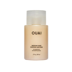 OUAI front bottle view showing clean packaging and travel-friendly size benefit