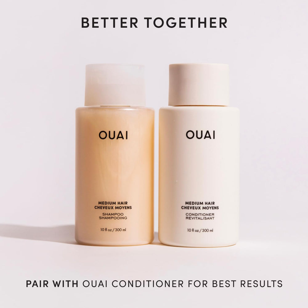 OUAI pump dispensing shampoo into palm for easy, no-mess application benefit