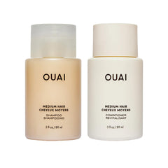 OUAI travel shampoo and conditioner front view showing compact bottles and convenience
