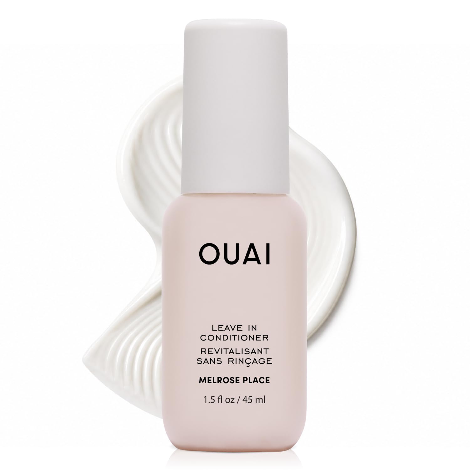 OUAI travel bottle front packaging showing compact convenience and brand appeal