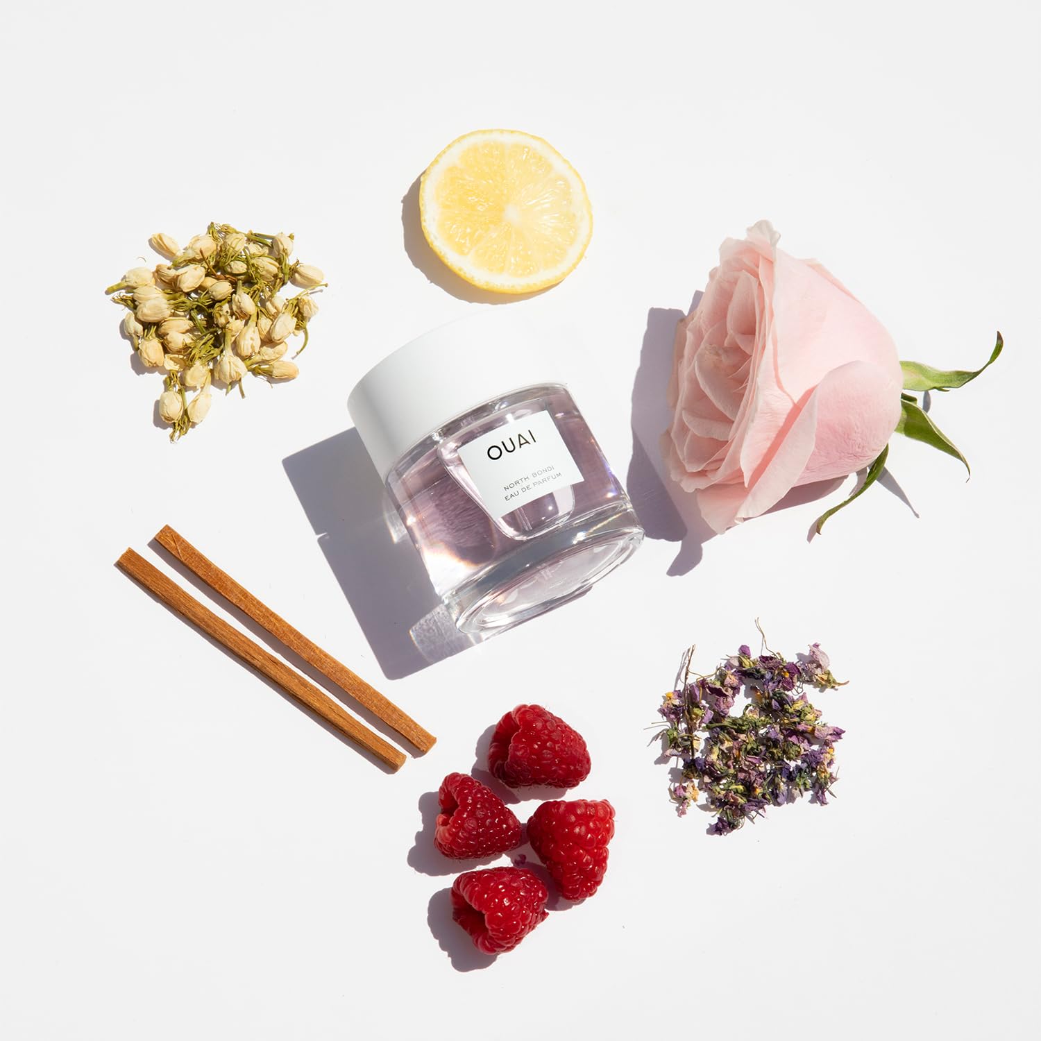 OUAI North Bondi angled bottle highlighting sleek design and portability benefit