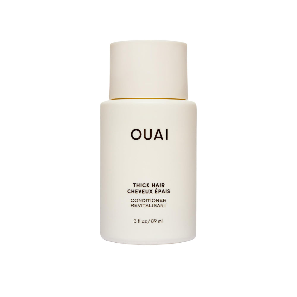 OUAI front view of 32 ounce conditioner bottle showing packaging and benefit of long-lasting supply