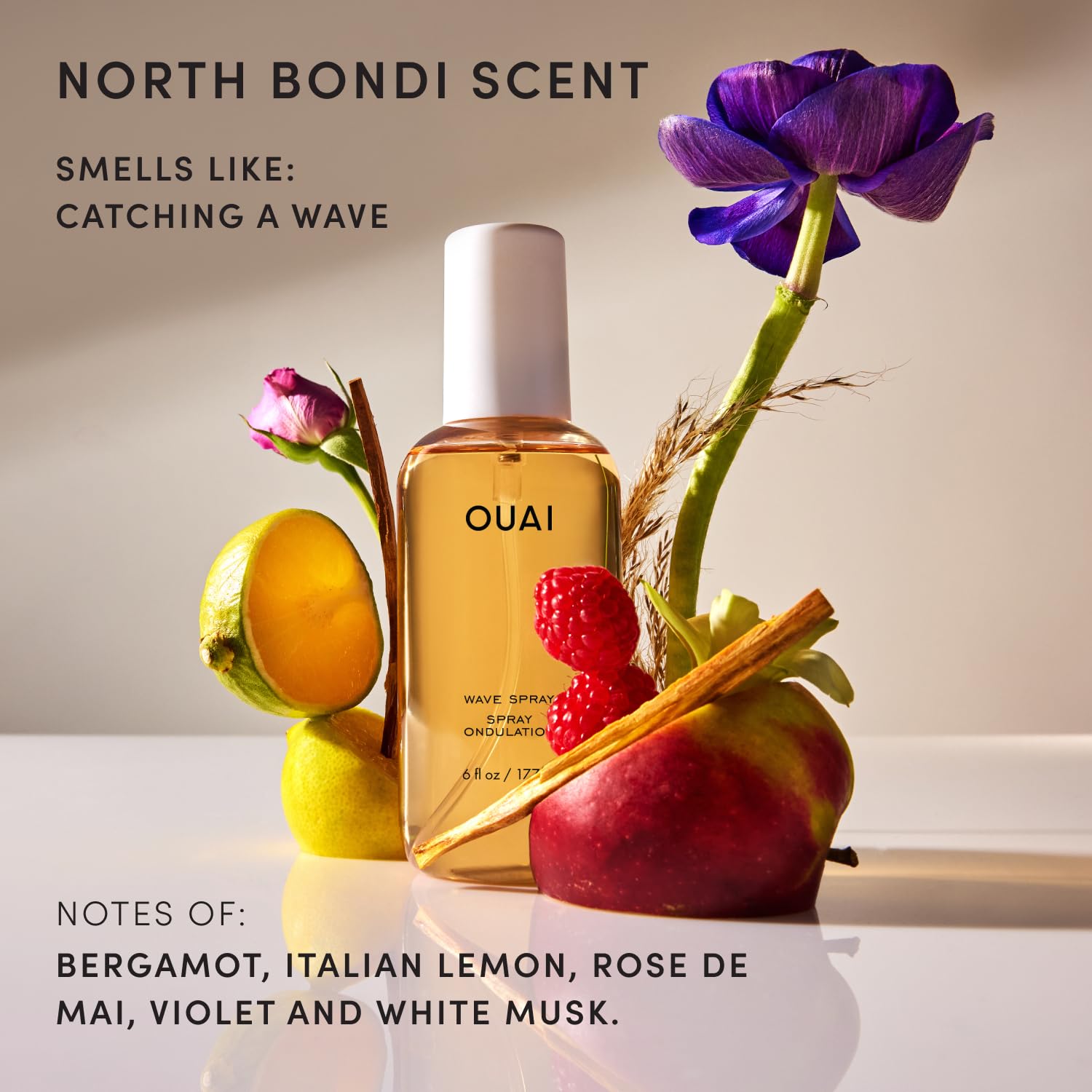 OUAI wave spray used on beachy hair giving tousled volume and shine