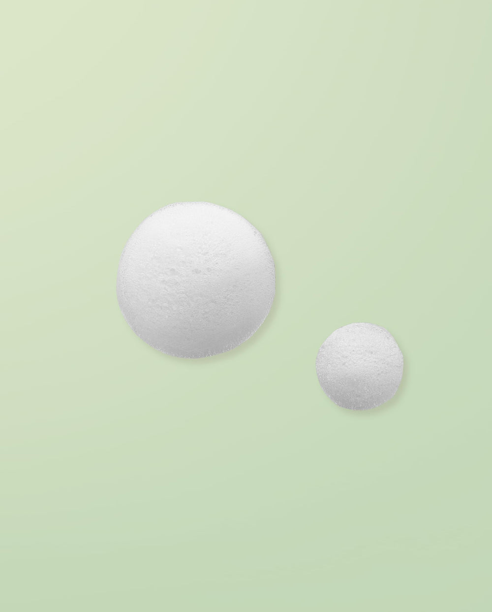 Ouidad mousse texture close-up highlighting lightweight, non-greasy hydration