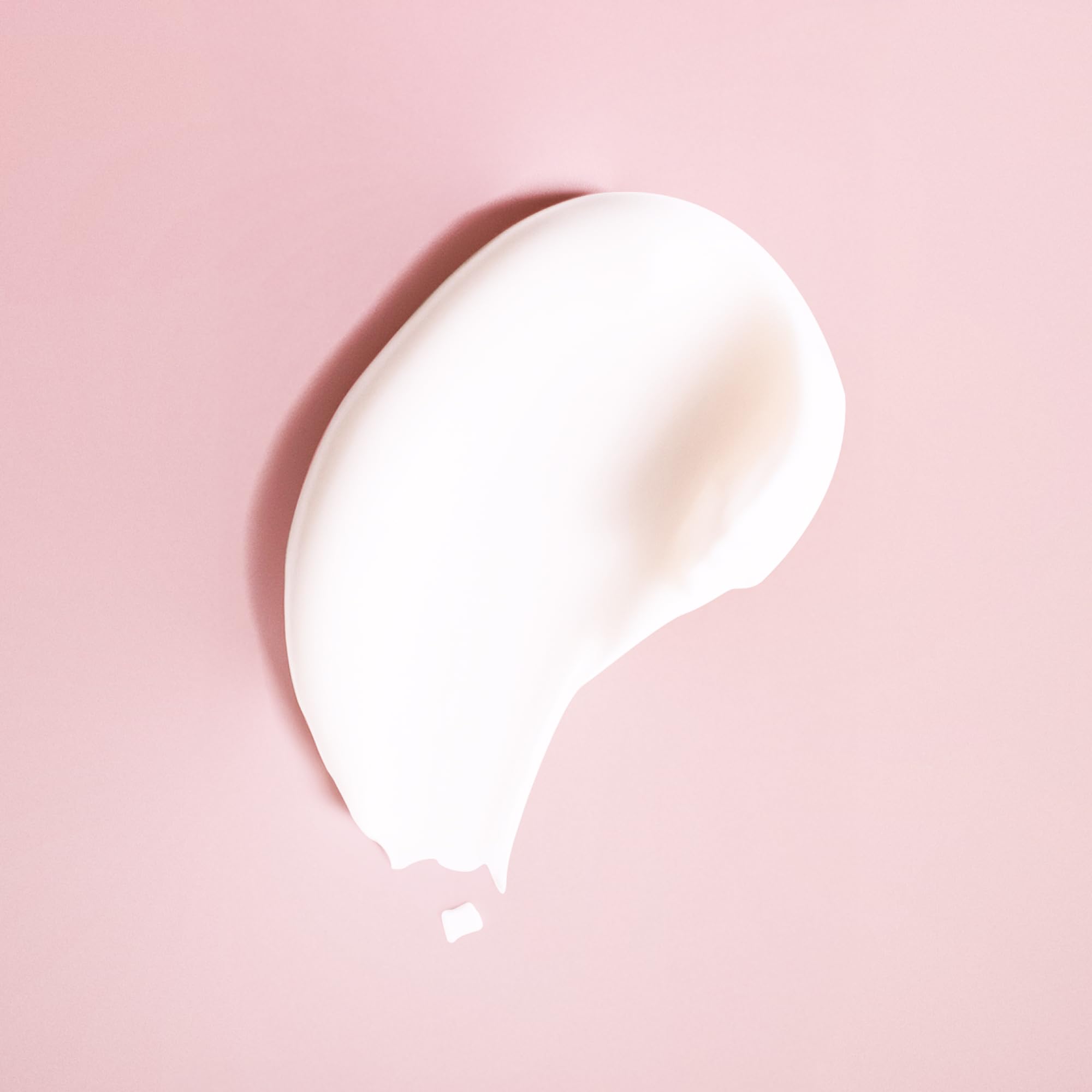 Ouidad conditioner creamy texture close-up illustrating slip and hydration
