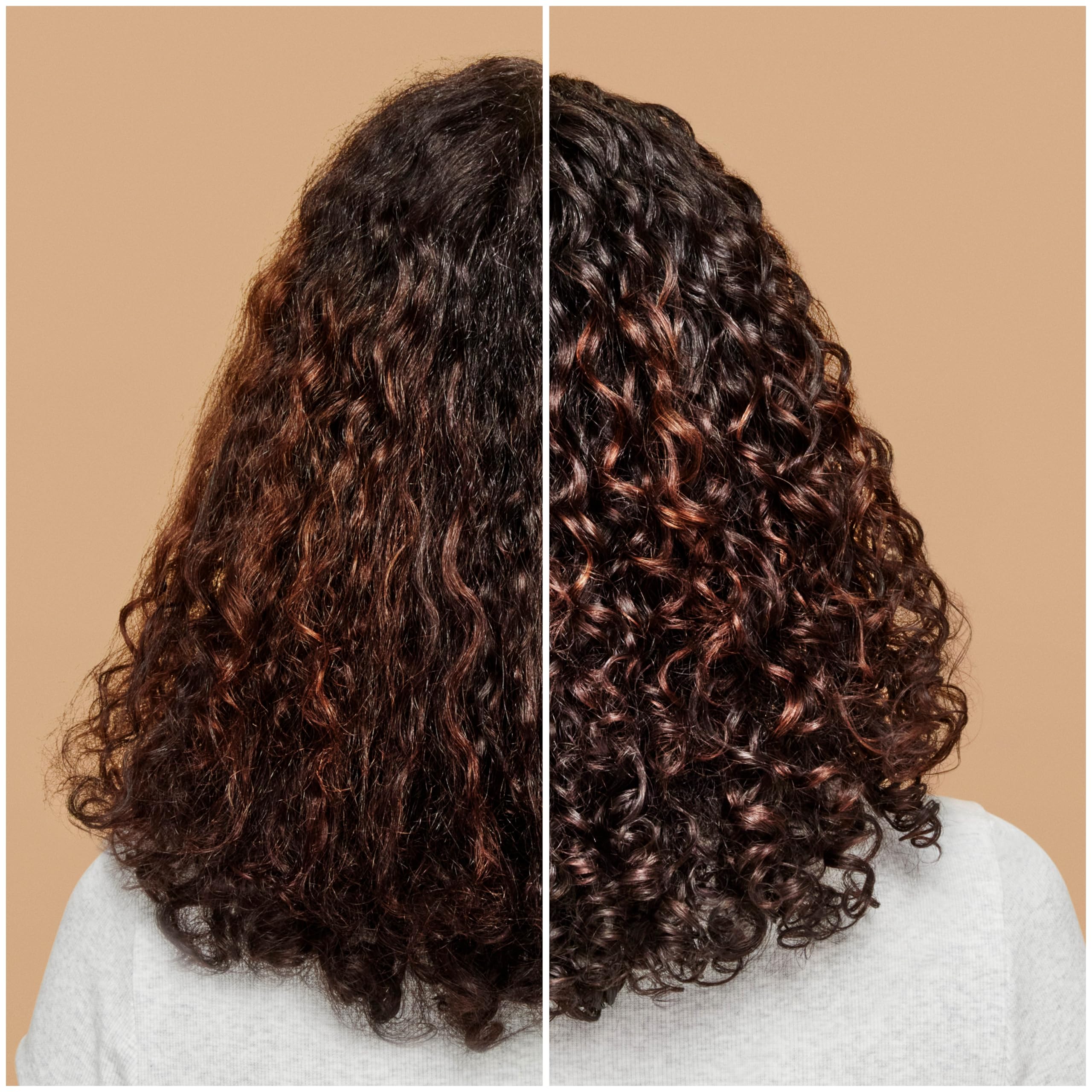 ouidad styling cream on hand applied to curly hair for soft definition