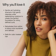 Ouidad being rinsed in shower shows practical use and manageable curl cleansing