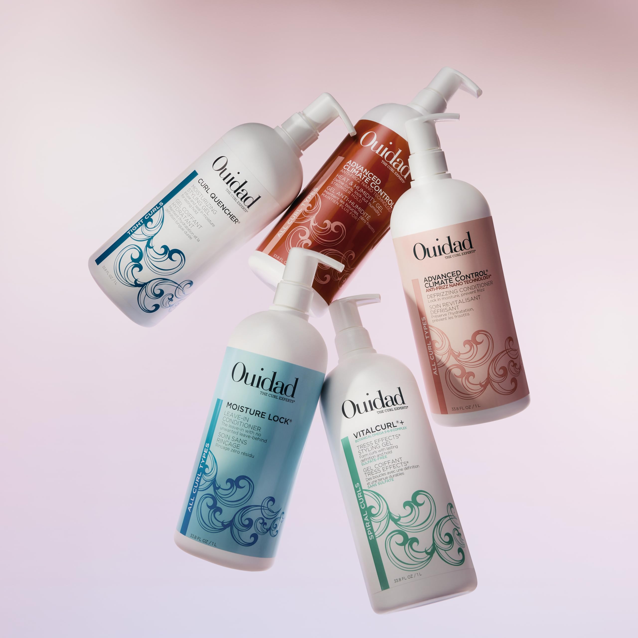Ouidad in a bathroom setting shows routine-ready product for consistent curl care