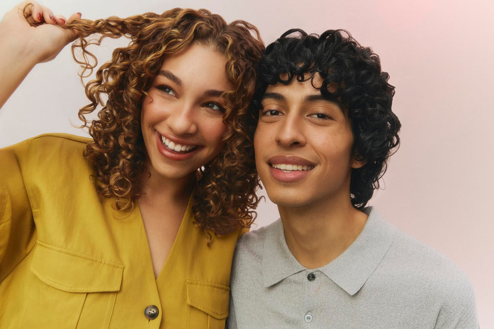 Texture of Ouidad Curl Shaper milk illustrating lightweight hydration