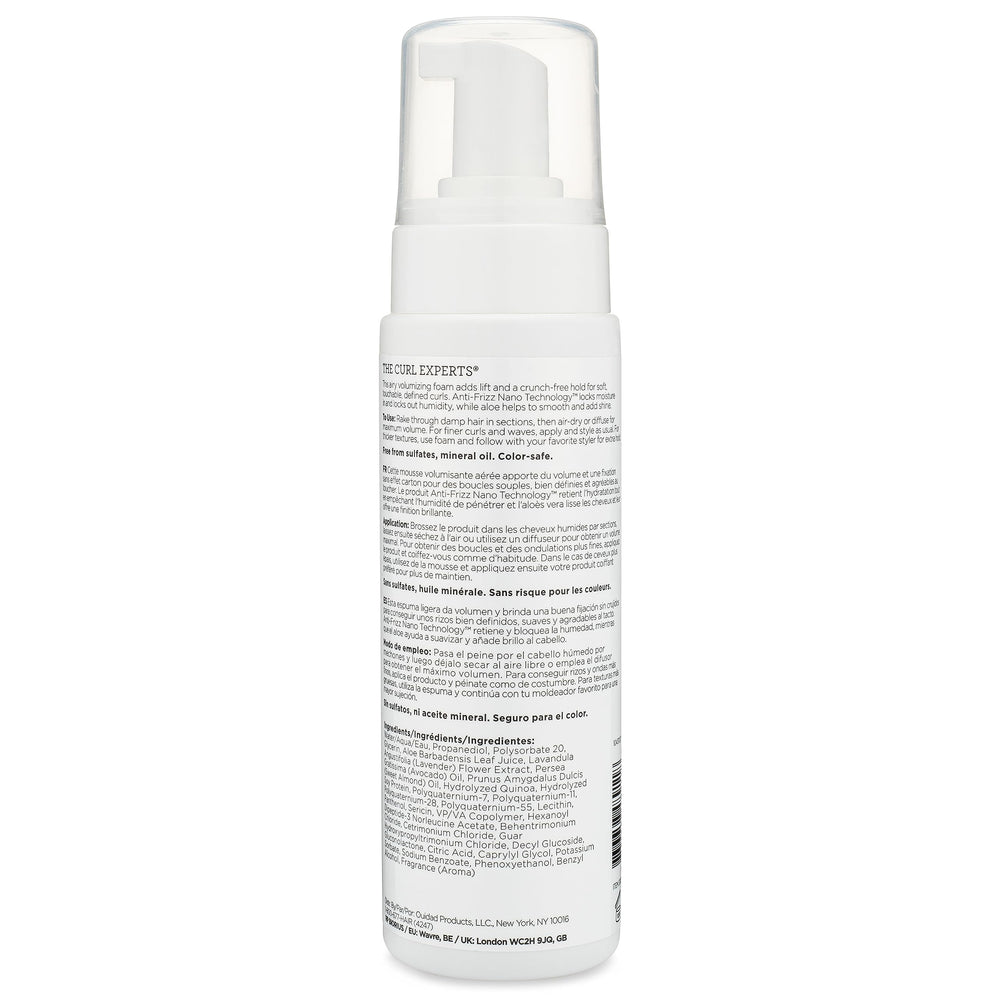 Ouidad foam being dispensed into hand for easy application