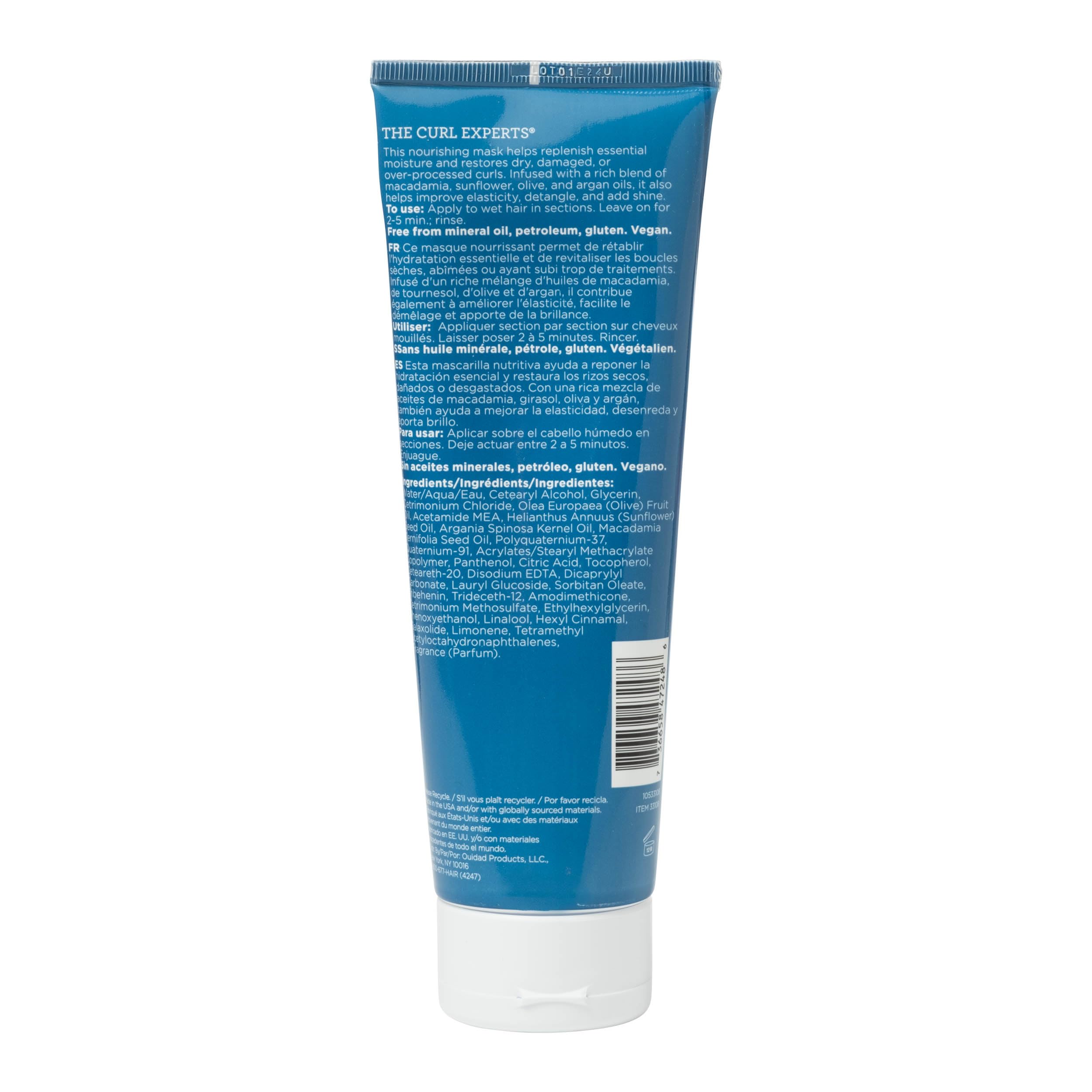 Ouidad cream texture close-up showing rich slip and moisturizing feel