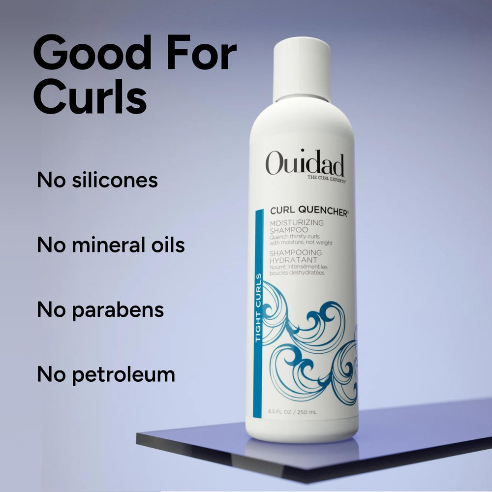Ouidad shampoo placed in shower scene illustrating daily curl care use