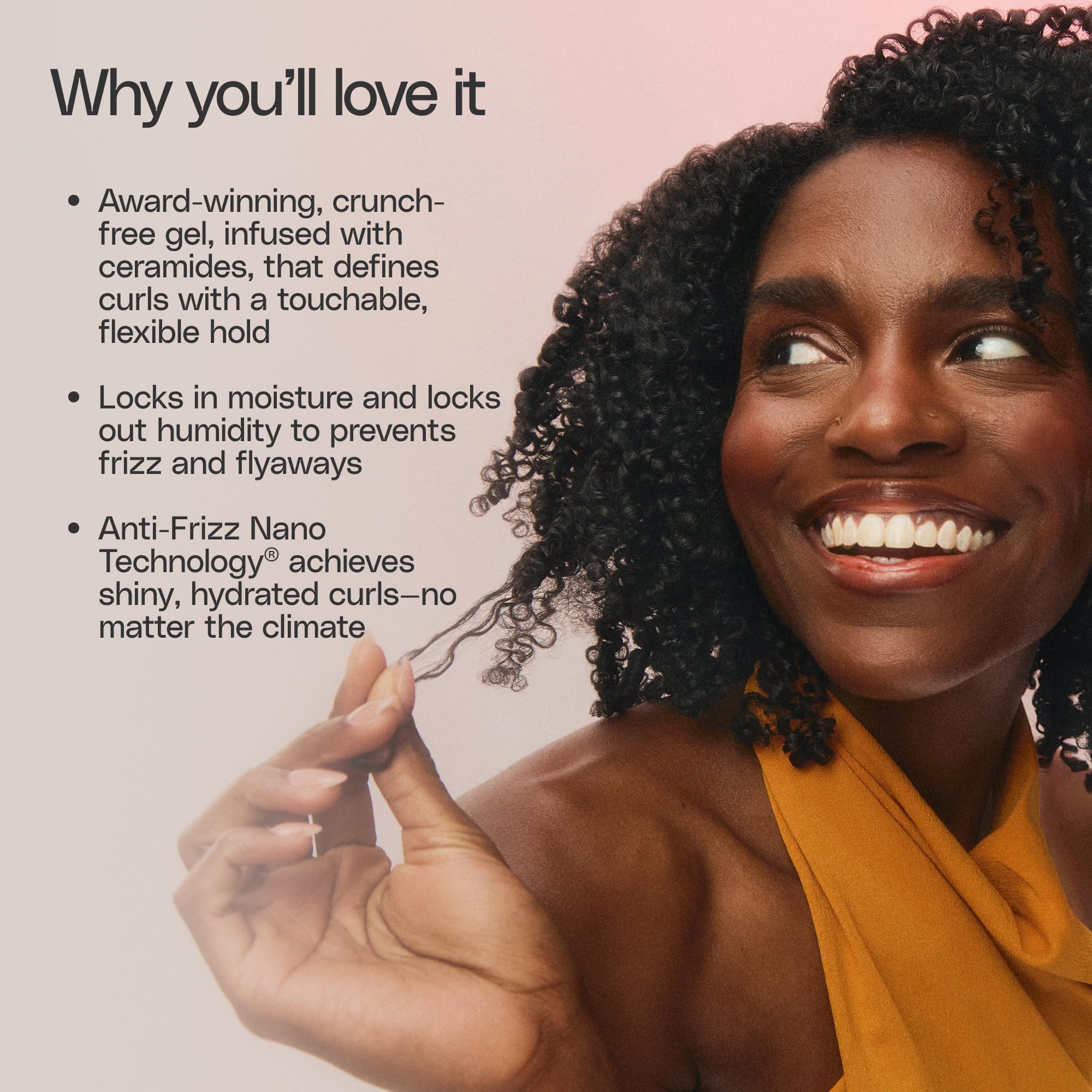 Ouidad model with shiny defined curls showing natural movement and control