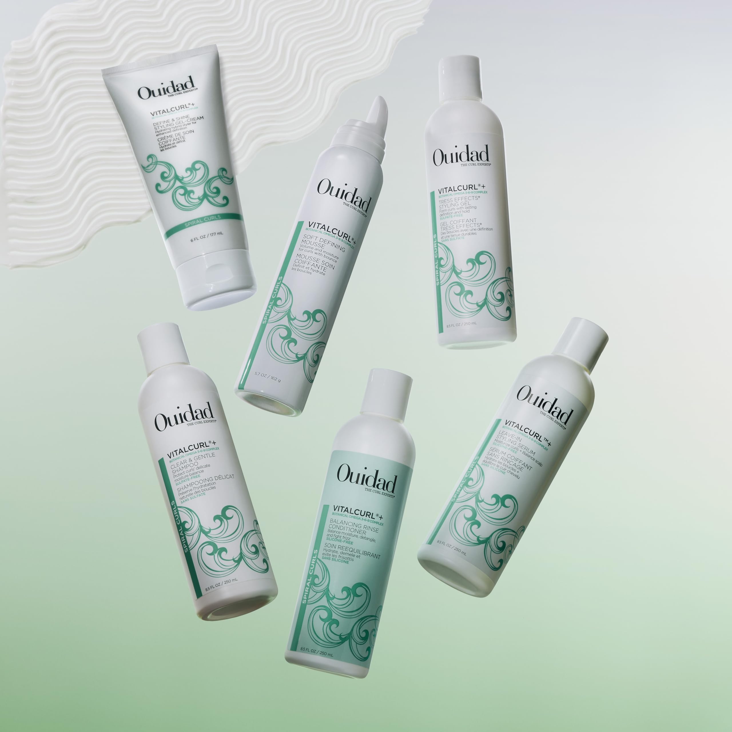 Ouidad VitalCurl+ label closeup displaying ingredient highlights and clean formulation