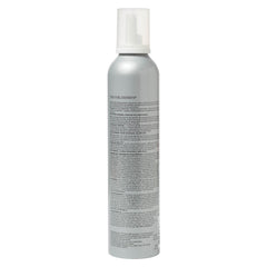 Close-up whipped cream texture of Ouidad showing rich moisture and easy spreadability