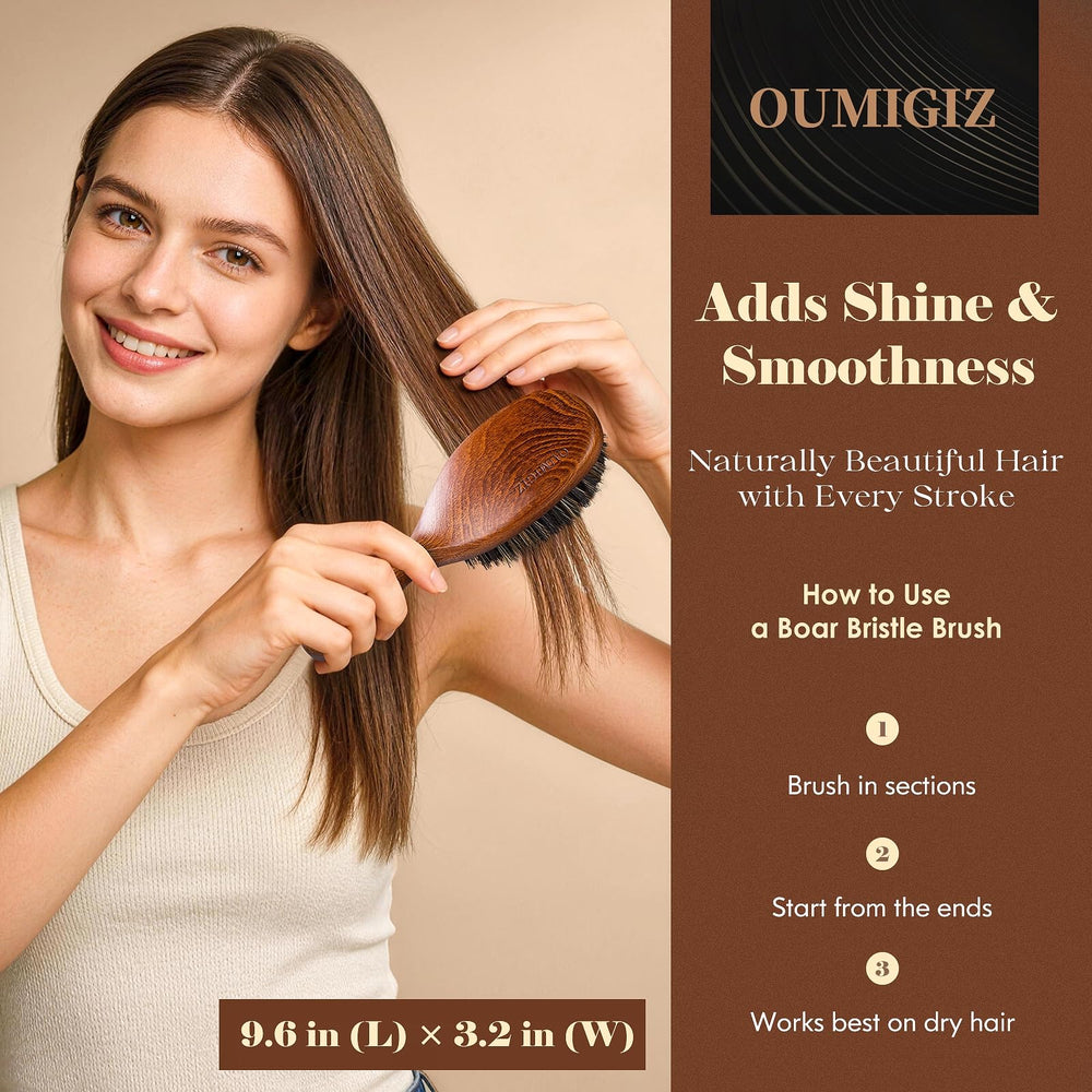 Oumigiz brush in hand to show scale and ergonomic comfort while styling