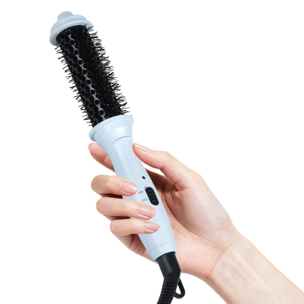 Ouphiny mini thermal brush front view showing compact design and handle for travel convenience