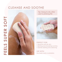 Our Earth Beauty wet sponge creating light foam on skin, showing gentle cleansing benefit