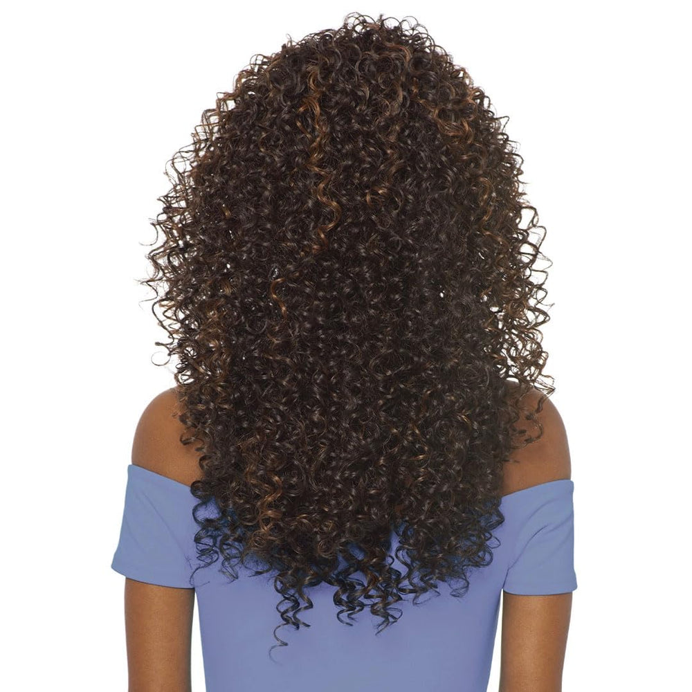Outre half wig worn by model demonstrating blended natural look and movement