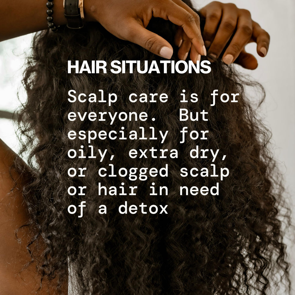 Applying Pacifica serum directly to the scalp illustrating precise application and soothing