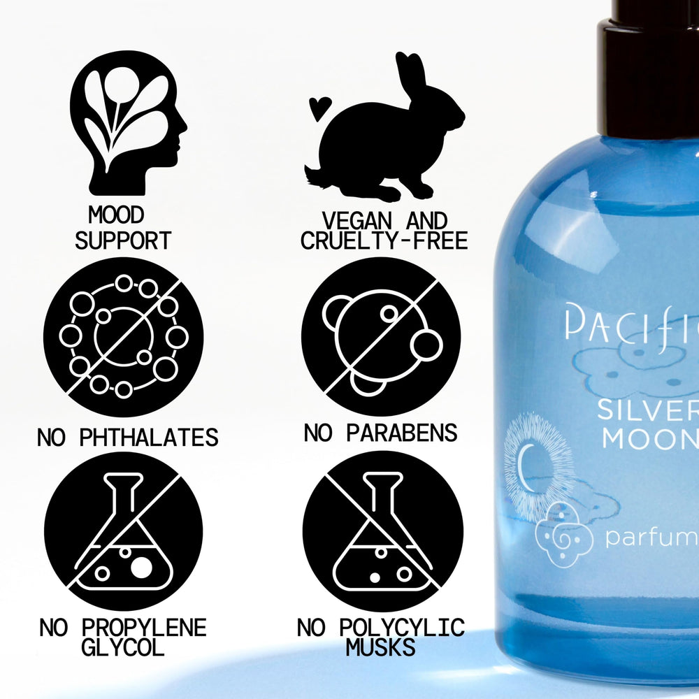 Pacifica Silver Moon bottle held in hand to show travel-friendly size and portability