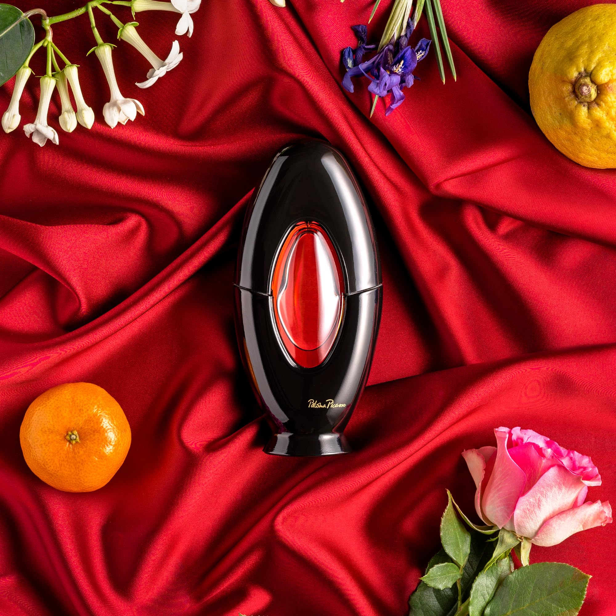 Paloma Picasso spray applied in evening outfit scene suggesting long‑lasting confidence