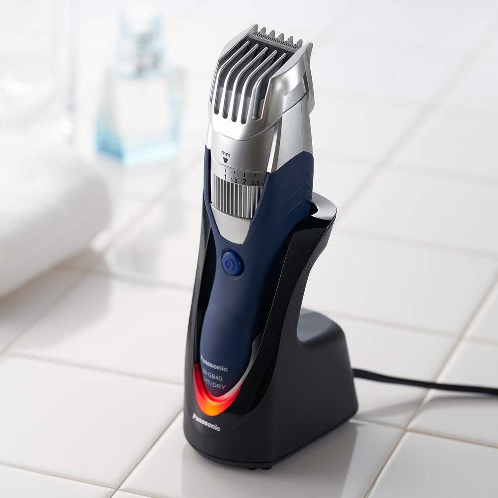Panasonic ER-GB40-S on AC charging stand with indicator light for quick charging status