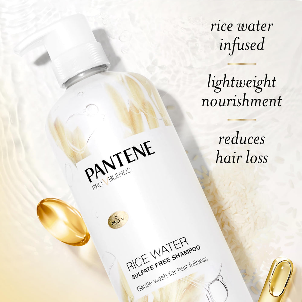 Pantene rice water 30 oz bottle next to standard-sized bottle for scale