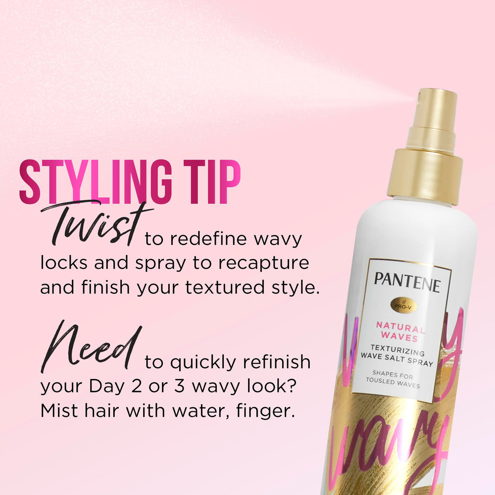 Pantene can held in hand to show scale and travel-friendly convenience