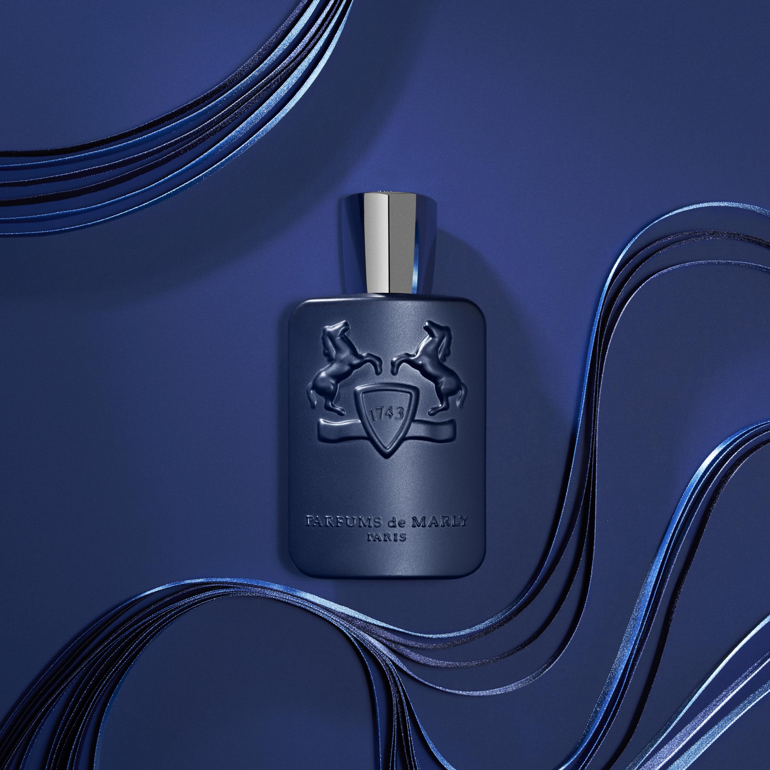 Parfums de Marly Layton bottle on dresser styling suggesting evening wear