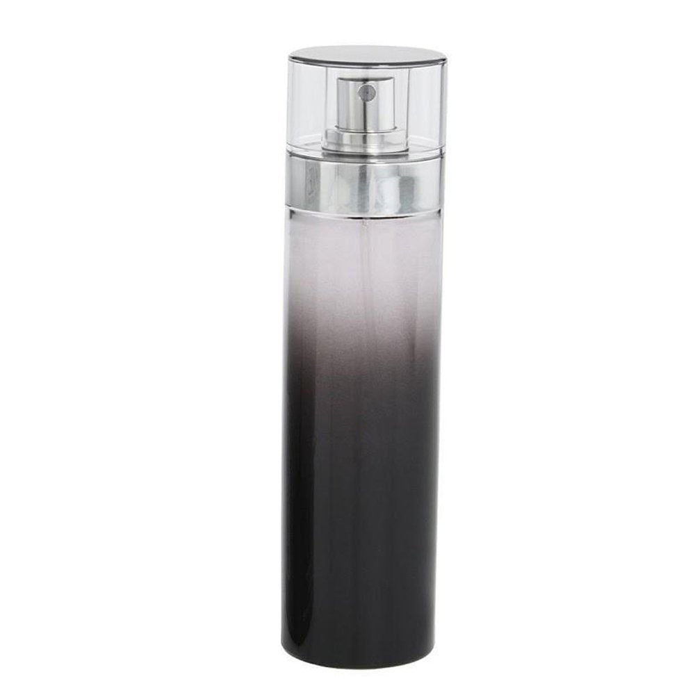 Paris Hilton Just Me men spray in hand lifestyle shot demonstrating easy daytime use