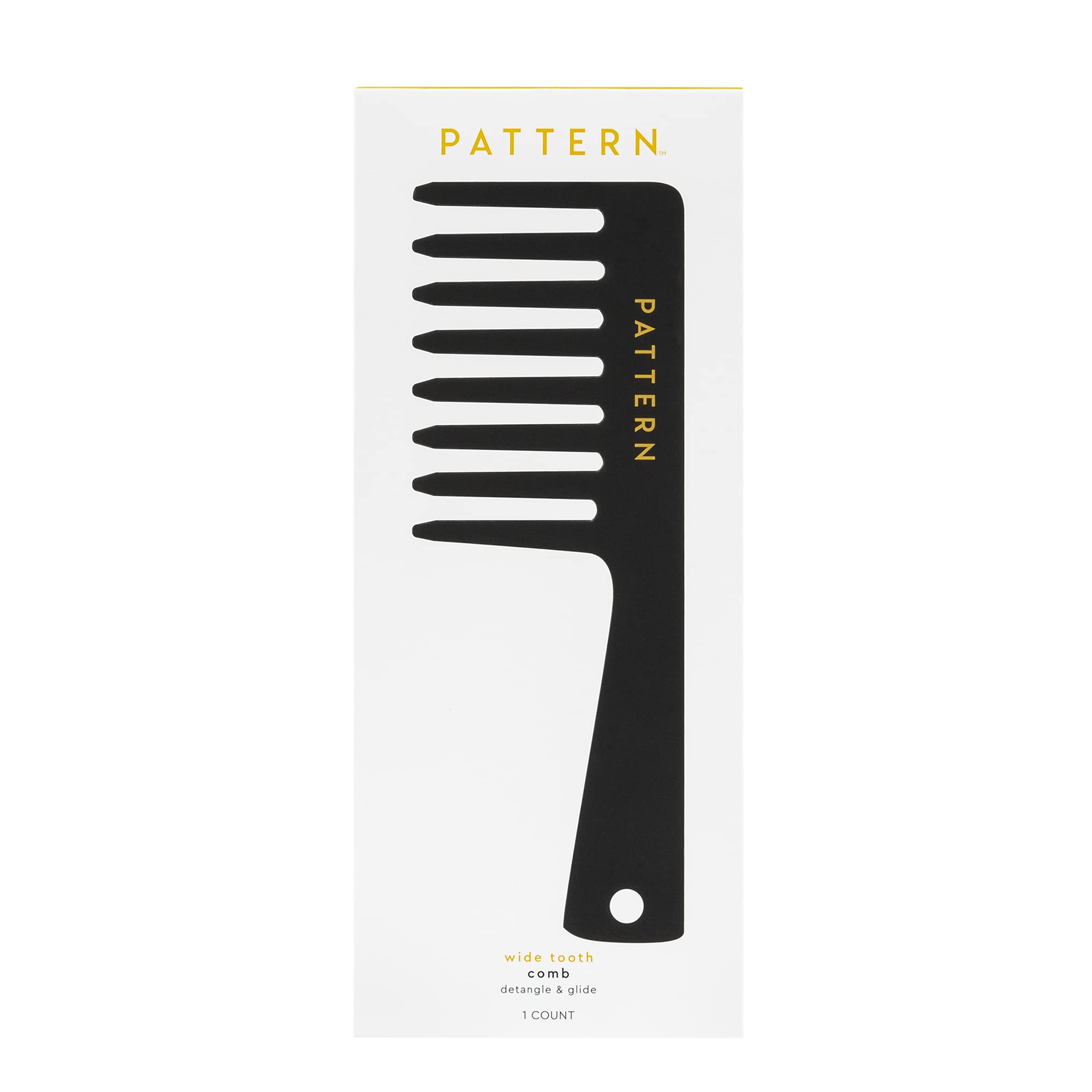 PATTERN comb held in hand to show scale and comfortable control
