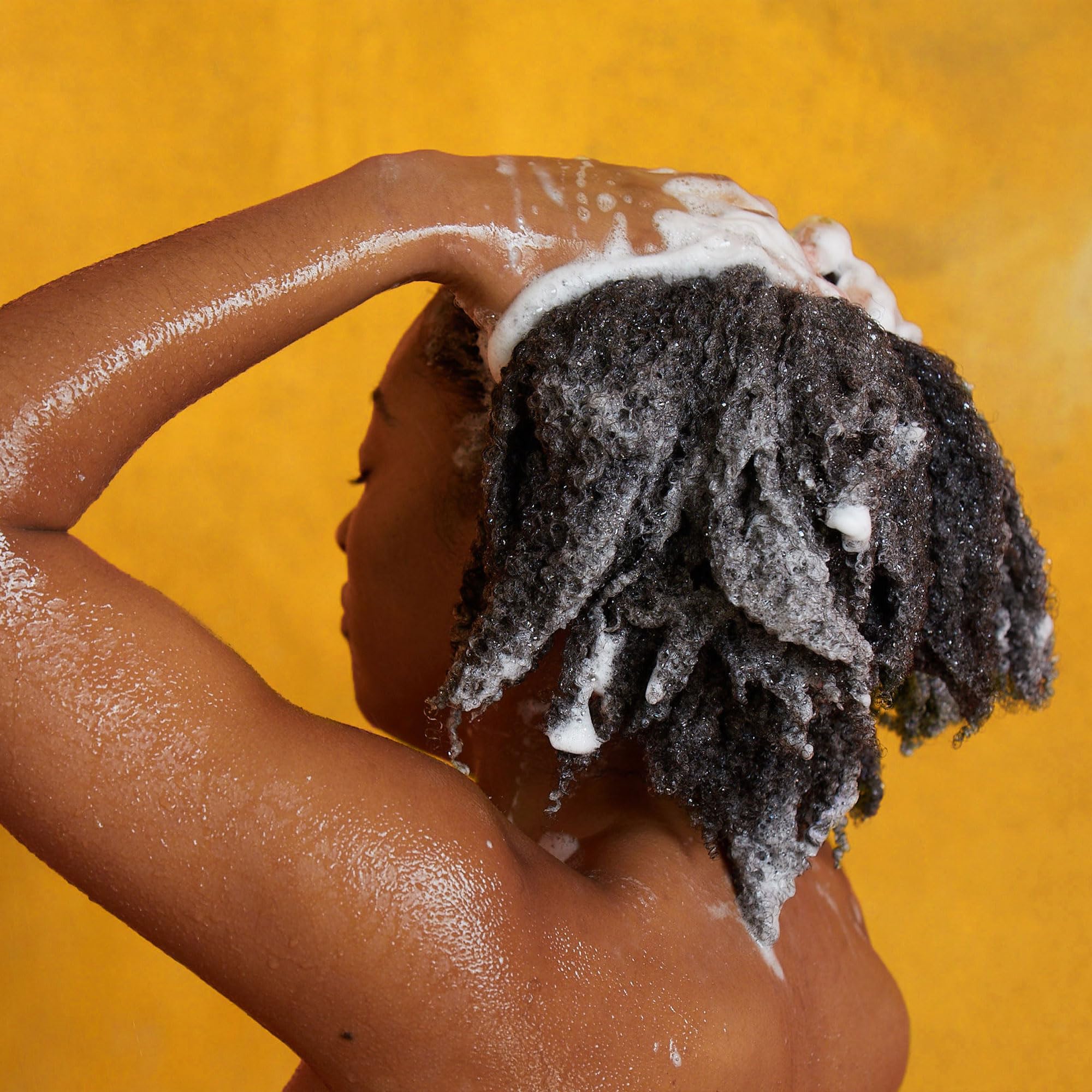 PATTERN shampoo texture on hand showing rich creaminess and slip