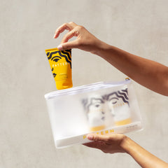 PATTERN clear zip bag in a styling scene with mini products for organized travel-ready curl care
