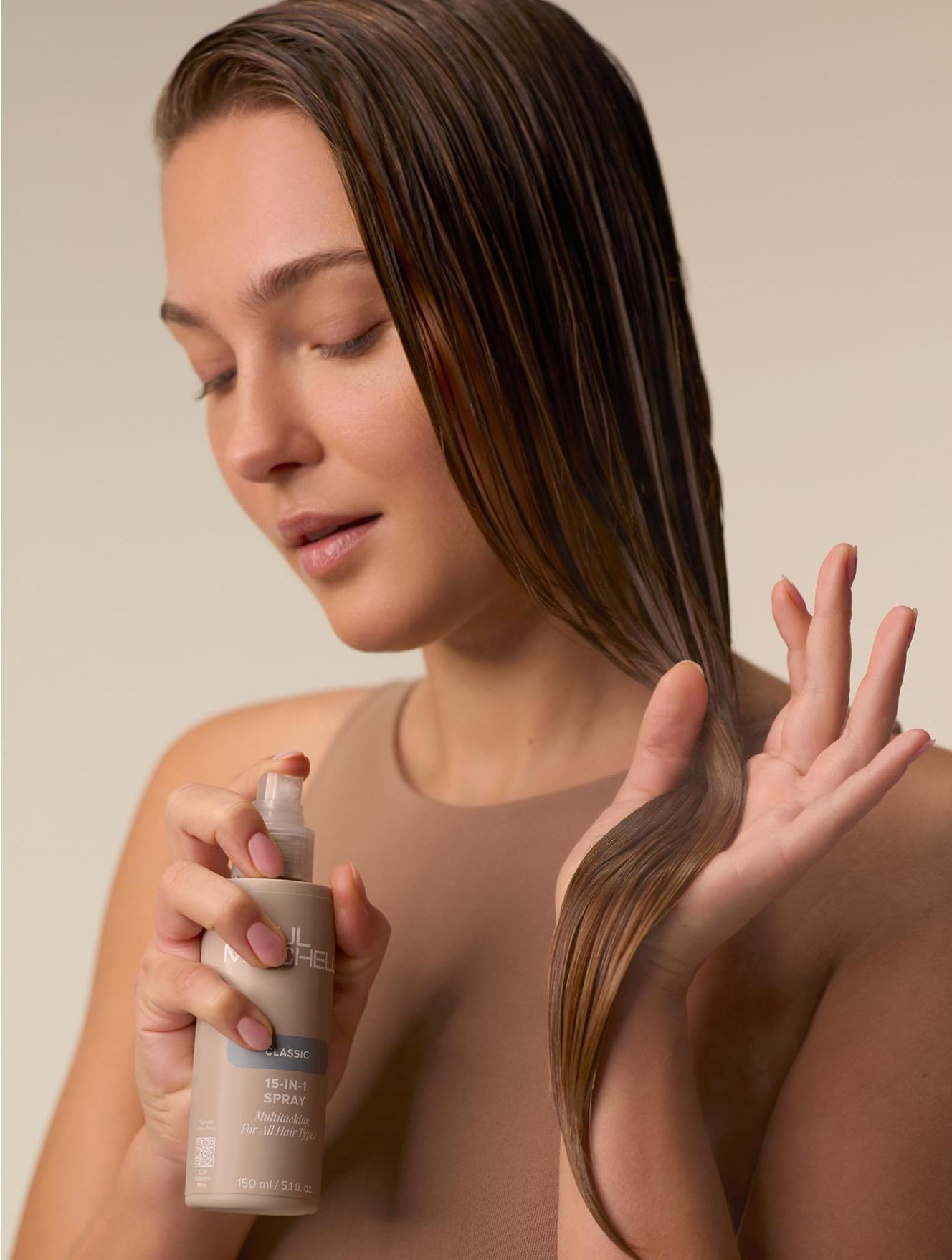 Paul Mitchell spray texture close-up on strands demonstrating lightweight finish