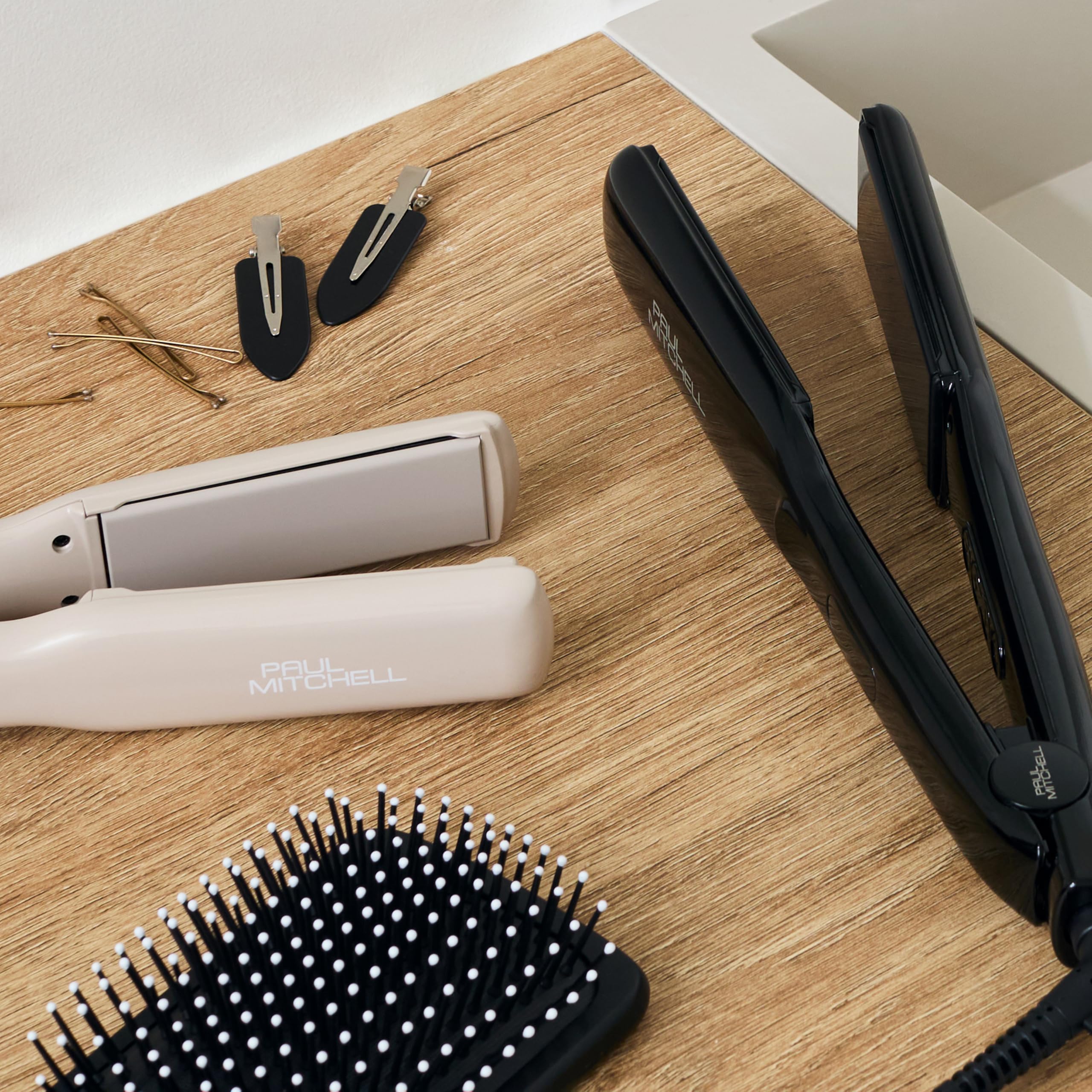 Paul Mitchell 427 lifestyle on bathroom vanity suggesting salon results at home