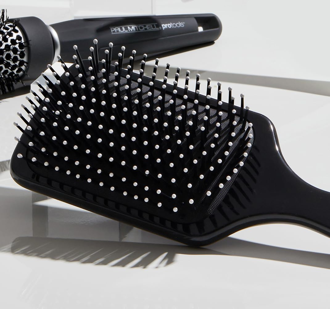 Paul Mitchell 427 side profile highlighting lightweight ergonomic handle for comfort