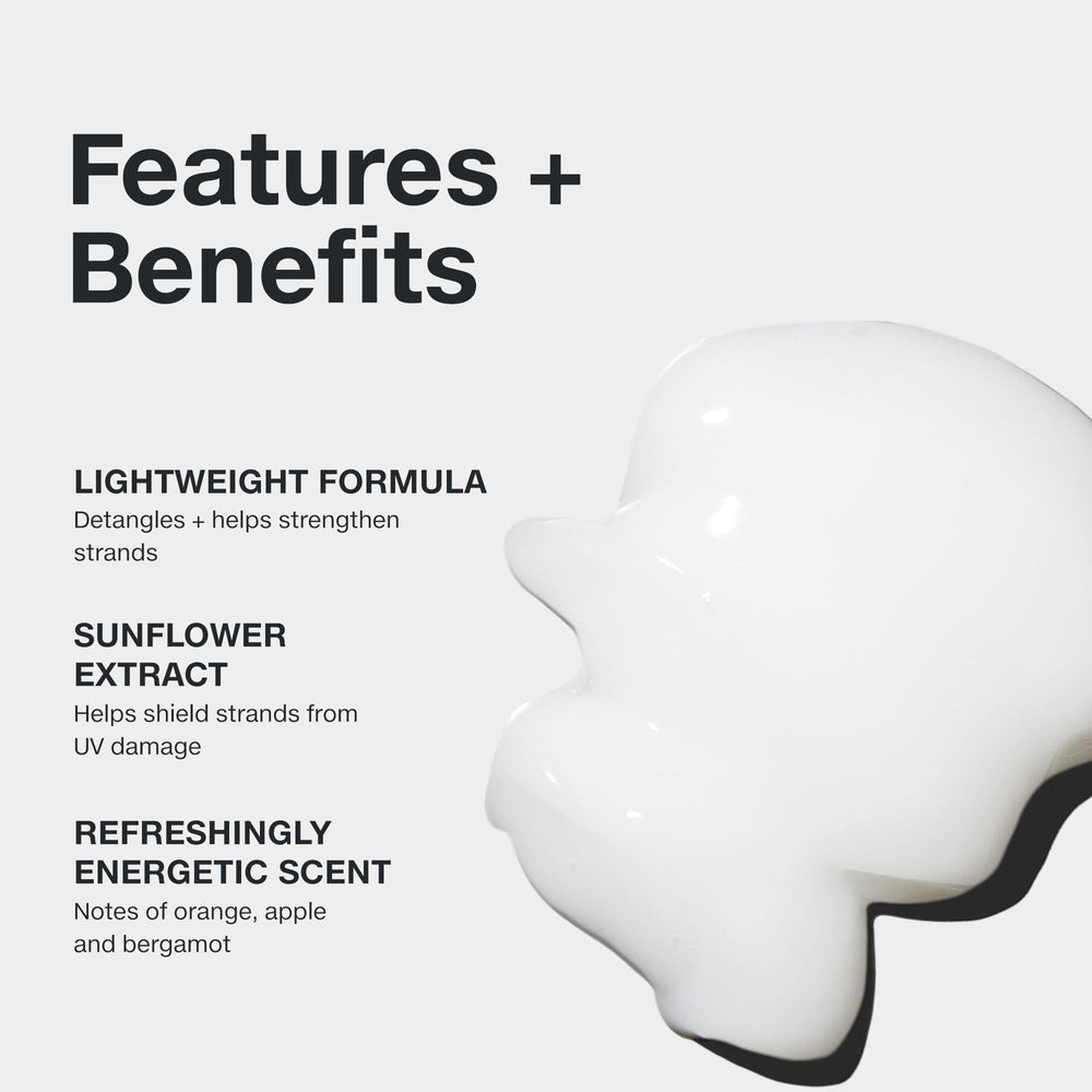 Paul Mitchell conditioner creamy texture close-up demonstrating smooth detangling benefit