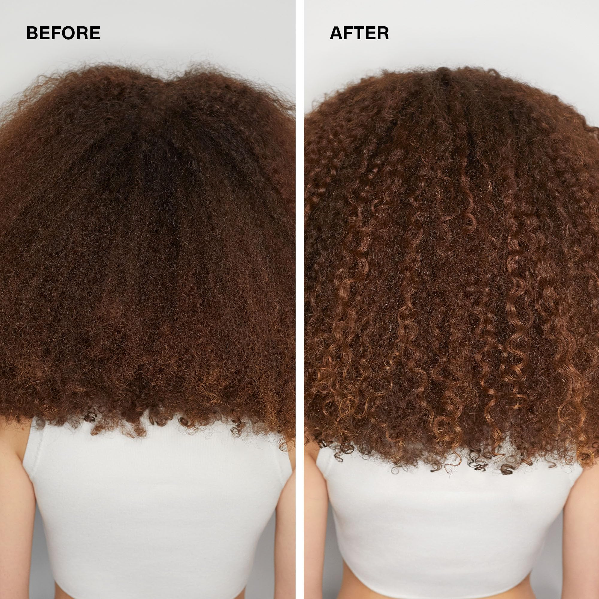Paul Mitchell conditioner being held to show 10.14 fl oz scale and travel convenience