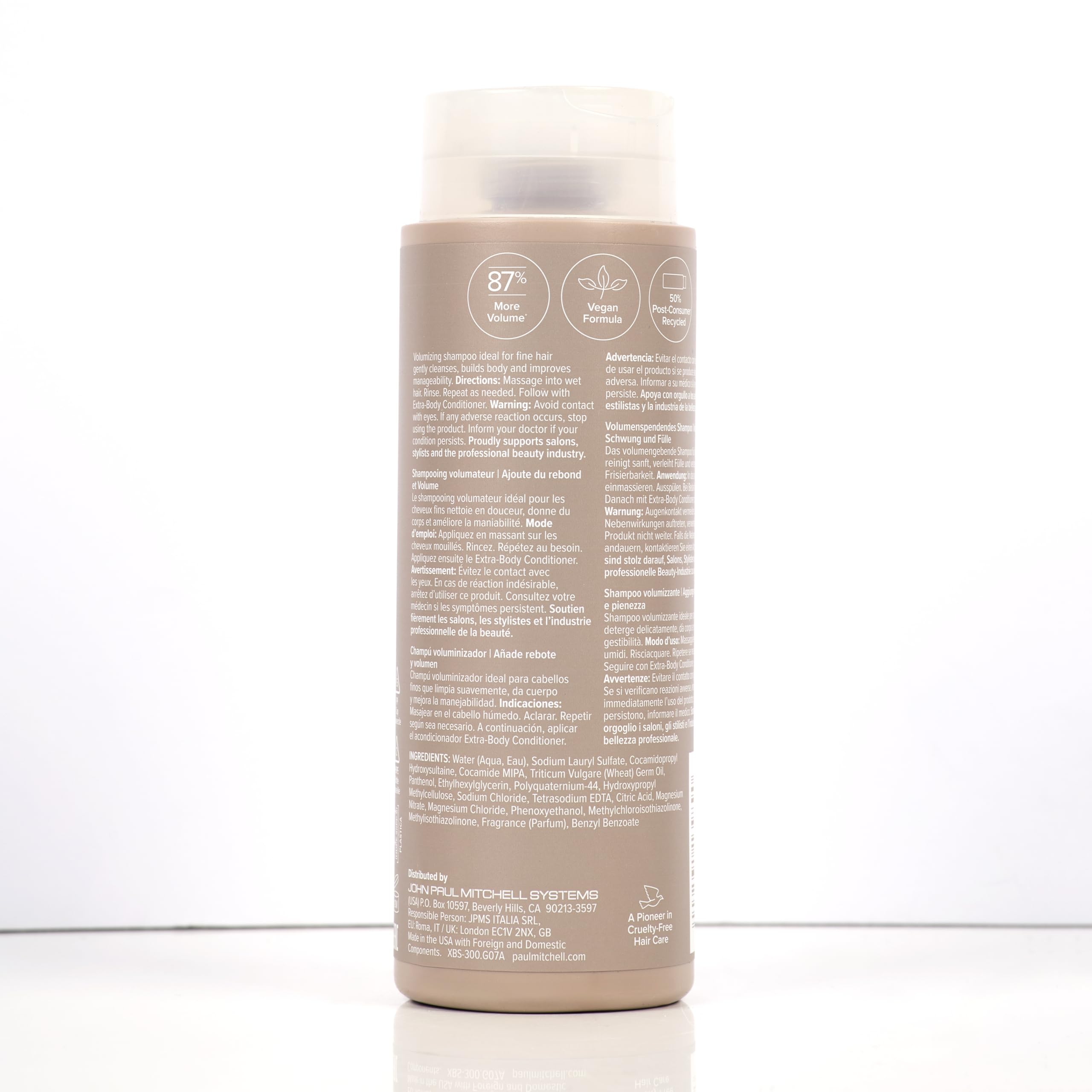 Paul Mitchell Extra-Body on bathroom shelf conveying salon-quality routine benefit