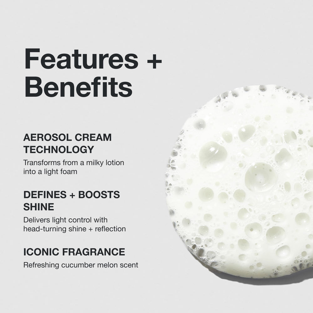 Foam from Paul Mitchell pomade on hand being smoothed, shows lightweight application benefit