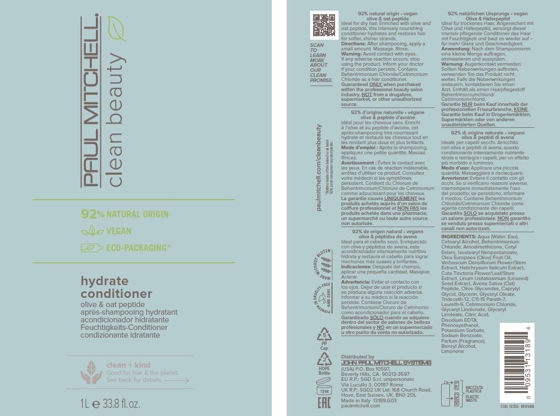 Paul Mitchell conditioner in salon setting demonstrating softer, more manageable hair