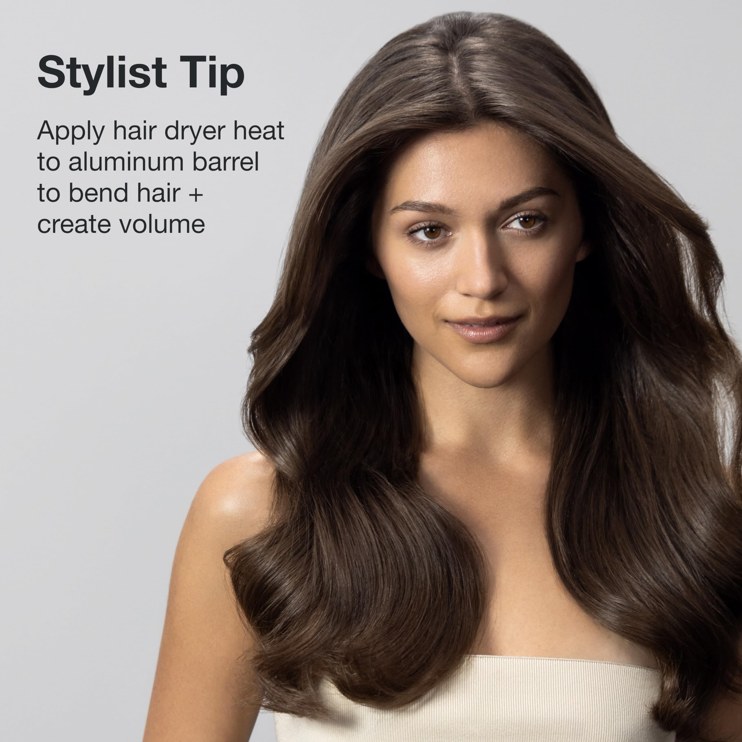 Paul Mitchell brush used in salon setting for polished blowout and body