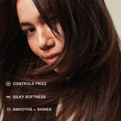 Paul Mitchell serum texture on hand showing lightweight consistency