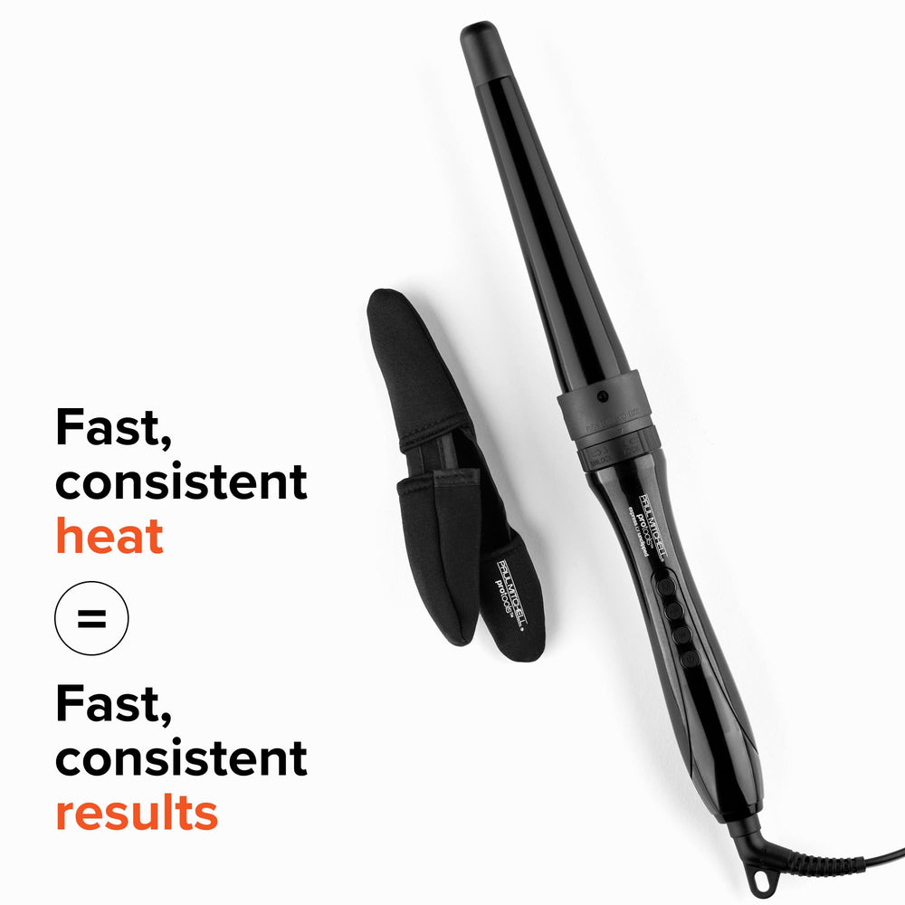 Paul Mitchell wand beside hand to indicate scale and easy maneuverability