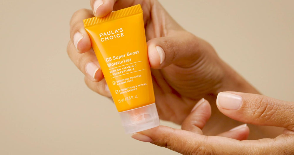 Paula's Choice tube on bathroom vanity in a morning routine setting for layering ease