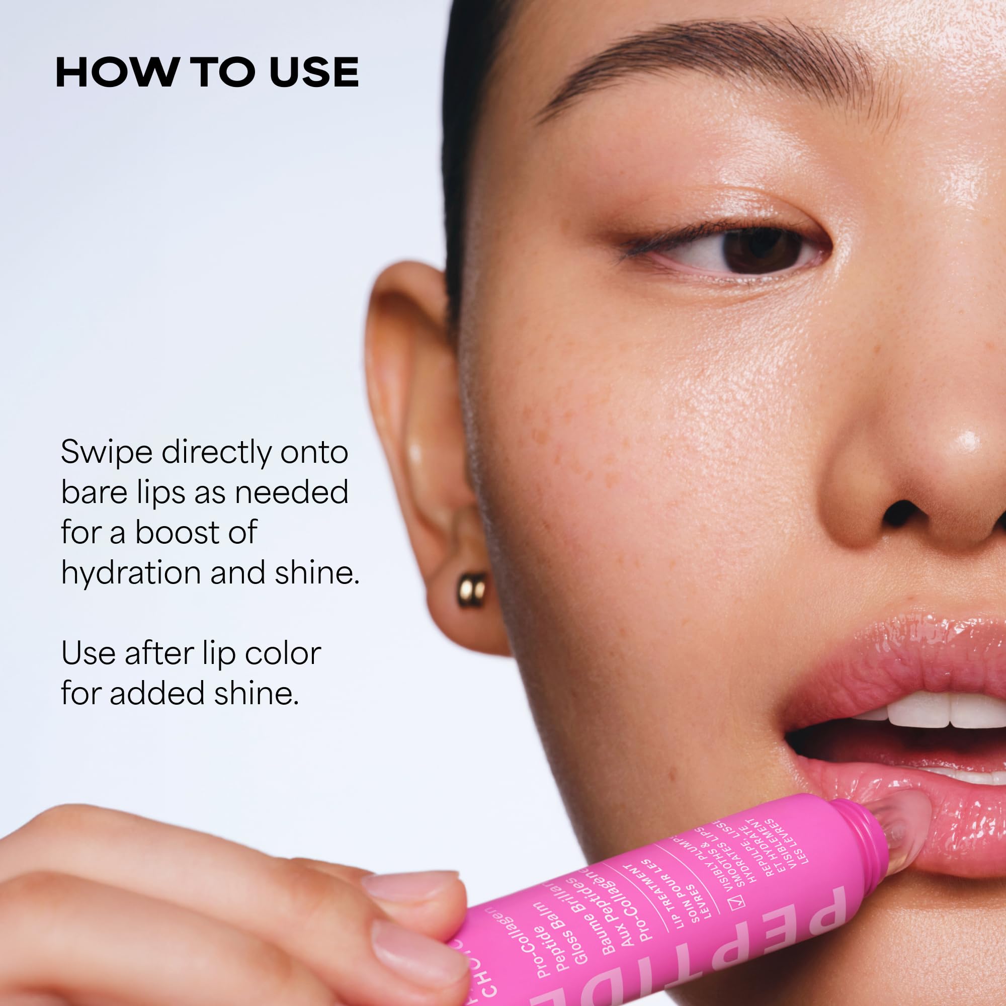 Paula's Choice gloss applied to lips showing plumper, shiny appearance