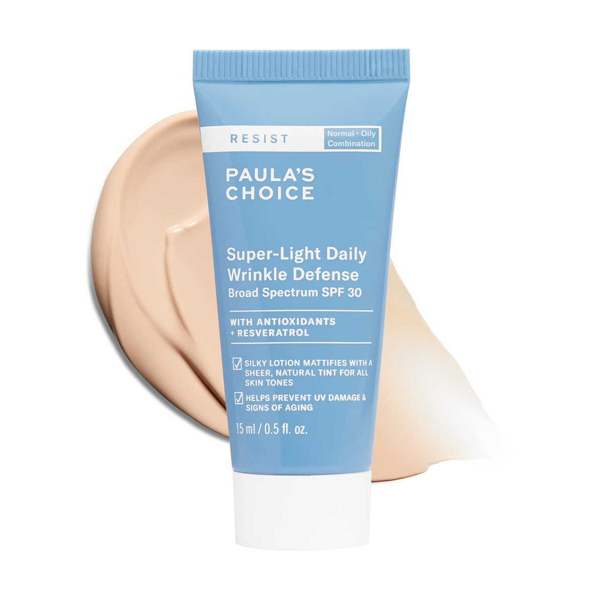 Paula's Choice front packaging showing compact tinted mineral tube and SPF label benefit