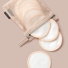Paula's Choice rounds held in hand showing size and practical scale